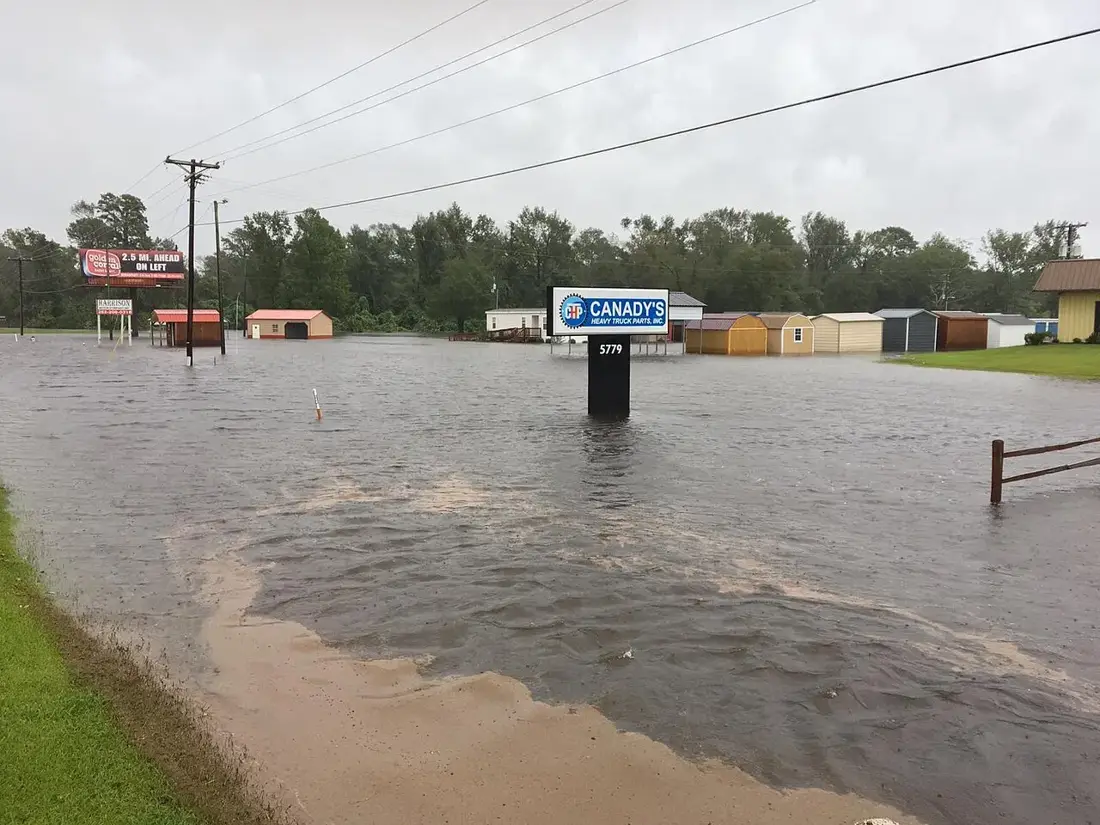 Floodwater surrounding businesses along a road in La Grange, NC during Tropical Storm Florence